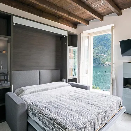 Guesthost - Lovely Lakefront Studio-flat Apartman *